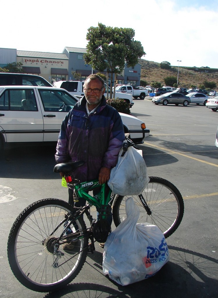 Recycling by bike - biker in Sand City