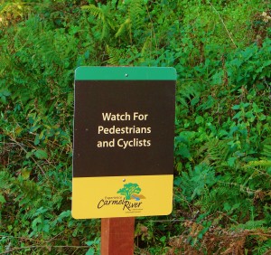 Experience Carmel River sign - watch for cyclists and peds